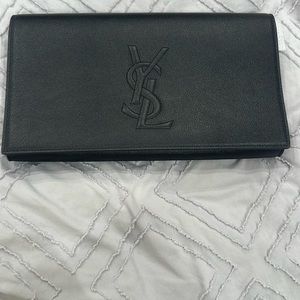 Brand new YSL clutch. Never used! With tags. Has dust cover